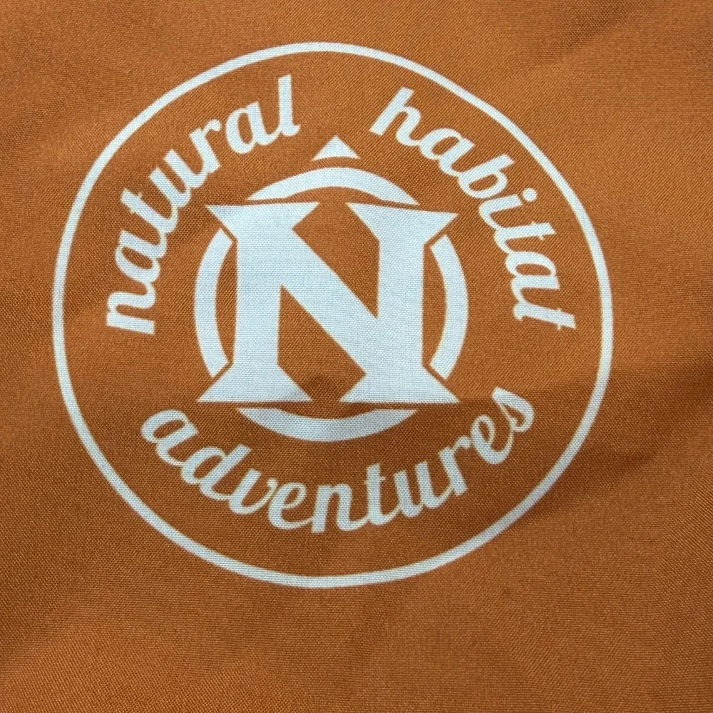 ChicoBag Natural Habitat Adventures Travel Pack Recycled Orange Black Backpack